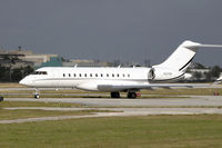 N379G @ FXE - Holding short for takeoff on runway 8 - by Bruce H. Solov