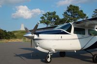 N610KC @ KFFA - Short stop at Kitty Hawk during for a photo op with the new paint scheme and an excellent backdrop. - by S.McLennan
