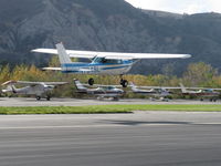 N704SL @ SZP - 1976 Cessna 150M, Cont9inental O-200 100 Hp, landing Rwy 22 in gusty crosswind - by Doug Robertson