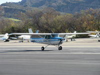 N704SL @ SZP - 1976 Cessna 150M, Continental O-200 100 Hp, landing roll Rwy 22, doing pattern work - by Doug Robertson