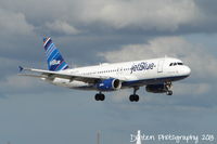 N592JB @ KSRQ - JetBlue Flight 1187 American Blue (N592JB) arrives at Sarasota-Bradenton International Airport following a flight from Boston-Logan International Airport - by Donten Photography