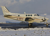 G-ORTH @ EGSH - Departing a snowy SaxonAir