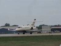 N800UK @ KOSH - Landing runway 27 - by steveowen