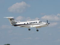 N699MW @ KOSH - taking off - by steveowen