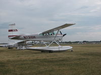 N7310H @ KOSH - Little out of place on the grass