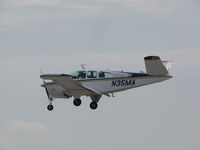 N35MA @ KOSH - landing at Oshkosh - by steveowen