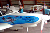 OH-XJP @ EFPI - Lancair 320 [169] Piikajarvi~OH 15/05/2003. Showing the art work on this side of the aircraft.