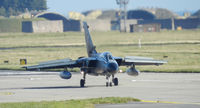 44 29 @ EGQL - a JBG-33 Tornado arrives back at Leuchars after a joint warrior mission,in the back ground can be seen is the old 111sqn HAS Complex ,where all the German tornado's were housed during their 2 week deployment - by Mike stanners