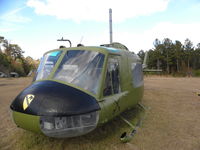 N414NA @ TLH - UH1C/M, Serial # 66-00608, under restoration to original U.S. Army 
condition while serving in Vietnam. Helicopter flew with the 191st AHC, 282nd AHC, 92nd AHC and the 176th AHC. The helicopter was later operated by NASA at the Kennedy Space Center in FL - by Kevin Vislocky