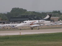 N161CE @ KOSH - landing at Oshkosh - by steveowen