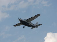 N807JA @ KOSH - departing Oshkosh - by steveowen