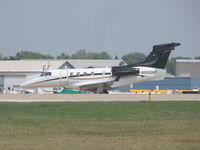 N900HT @ KOSH - landing at Oshkosh