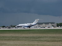 N835CB @ KOSH - Landing at Oshkosh - by steveowen