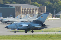 46 22 @ ADX - AG-51 Tornado taxiing back to its dispersal site on the south eastern corner of the airfield,note the based 6sqn Typhoon FGR.4's in the back ground - by Mike stanners