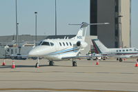 N408J @ KCID - Parked in front of the tower.