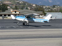 N704SL @ SZP - 1976 Cessna 150M,Continental O-200 100 Hp, landing roll Rwy 22 in gusty weather - by Doug Robertson