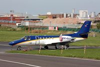 OE-GLG @ EGTG - Parked alongside the A38. - by Kev Slade