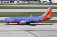 N734SA @ KFLL - Boeing 737-700 - by Mark Pasqualino