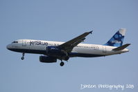N570JB @ KSRQ - JetBlue Flight 341 Devil With A Blue Dress On (N570JB) arrives at Sarasota-Bradenton International Airport following a flight from John F Kennedy International Airport - by Donten Photography