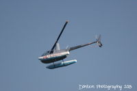 N644MH @ KSRQ - Robinson R-44 (N644MH) on approach to Sarasota-Bradenton International Airport - by Donten Photography