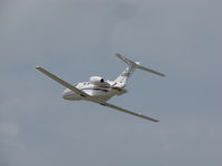 N39EG @ KOSH - CLIMBING OUT OF OSHKOSH - by steveowen
