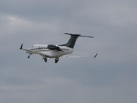 N900HT @ KOSH - DEPARTING OSHKOSH - by steveowen