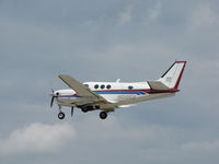 N108KU @ KOSH - WHEELS UP HEADING OUT OF OSHKOSH - by steveowen