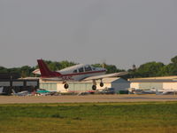 N8414C @ KOSH - DEPARTING RWY 09 OSHKOSH