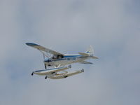 N117RB @ KOSH - DEPARTING OSHKOSH - by steveowen