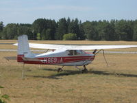 N6695A @ KOSH - SITTING FURLORN IN THE GRASS - by steveowen