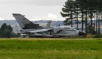 46 56 @ EGQL - JBG-32 Tornado ECR Lined up for take off loaded with  2x 330gal wing tanks,1x BOZ-101 chaff/flare,1xCerebrus III ECM pod
1x AIM-9L Sidewinder (AR),1x AGM-88 HARM practice round ,1x IRIS-T AAM - by Mike stanners