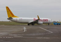 TC-APH @ EGSH - Being towed to the eastern apron by KLM Uk.
