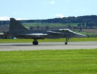 9236 @ EGQL - 211tl Gripen lands back to Leuchars after its display at the 2010 airshow - by Mike stanners