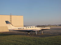 N682JS @ KOSH - in the setting sun on Basler FBO ramp