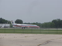 N381SK @ KGRB - taken from the parking lot - by steveowen
