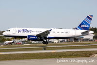 N807JB @ KSRQ - JetBlue Flight 9553 1. Fly JetBlue 2. Repeat Step 1 (N807JB) arrives on Runway 32 at Sarasota-Bradenton International Airport following a flight from Louis Armstrong - New Orleans International Airport - by Donten Photography