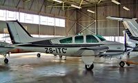 ZS-ITC @ FALA - Beech 95-B55 Baron [TC-1469] Lanseria~ZS 05/10/2003 - by Ray Barber