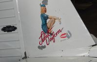G-AJJU @ EGFH - Artwork on the starboard side of Silvaire Deluxe G-AJ Juliet Uniform. - by Roger Winser
