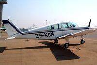 ZS-KCM @ FAGC - Beech C23 Sundowner 180 [M-2011] Grand Central~ZS 09/10/2003 - by Ray Barber