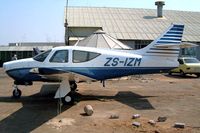 ZS-IZM @ FAGC - Rockwell Commander 112 [080] Grand Central~ZS 09/10/2003. Seen here minus propeller. - by Ray Barber