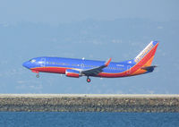 N369SW @ SFO - Landing at San Francisco - by Bill Larkins