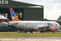 EI-DNP @ EGHH - A visitor to BASCO. - by Howard J Curtis