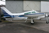G-BMMC @ EGHH - Parked outside what is now the Pilatus hangar. - by Howard J Curtis