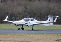G-CTCC @ EGHH - ex G-OCCZ wet departure - by John Coates