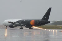G-POWD @ EGVN - Titan Airways B767 backtracking the runway at RAF Brize Norton - by Chris Hall