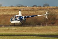 G-GJCD @ EGFH - R22 Beta operating from Swansea Airport. On loan to Heli-air Wales whilst G-LINS is away from base. - by Roger Winser
