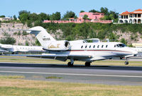 N931QS @ TNCM - N931QS