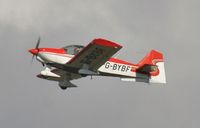G-BYBF @ EGHH - Departing in the winter sun - by John Coates
