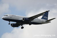 N709JB @ KMCO - JetBlue Flight 523 Brand Spankin'Blue (N709JB) arrives at Orlando International Airport following a flight from Newark Liberty International Airport - by Donten Photography