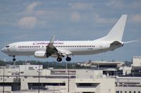 9Y-MBJ @ MIA - Caribbean 737-800 - missing tail logo - by Florida Metal